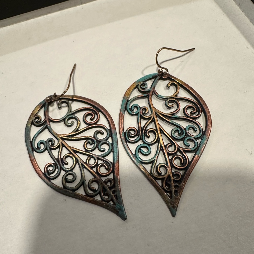 Women’s dangle earrings. Multi color leaf design